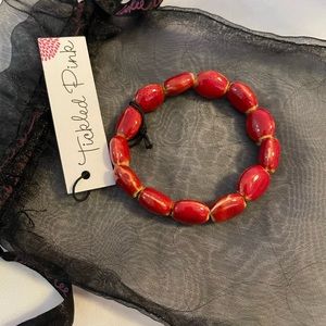 Tickled pink bracelet color red